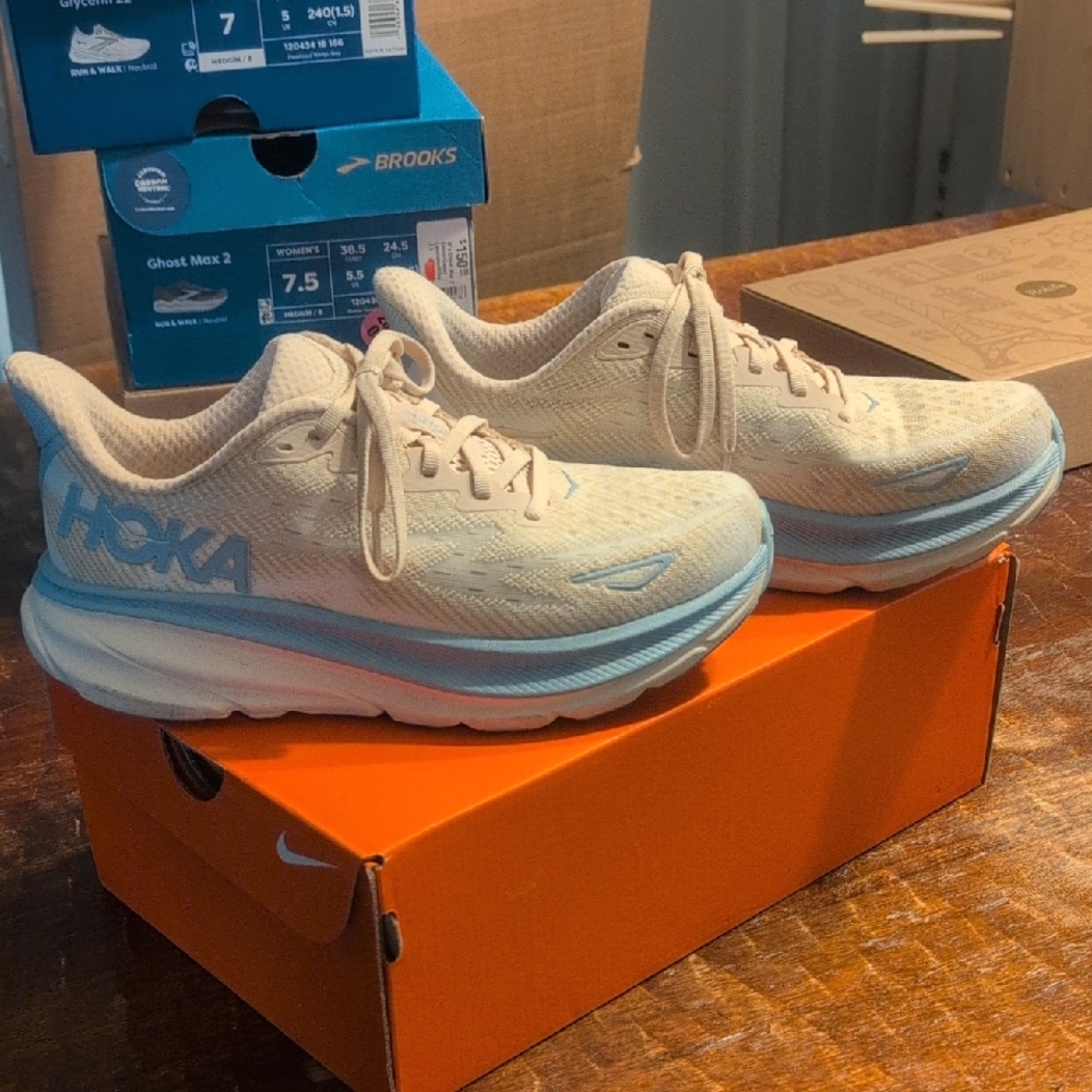 Hoka Cream and Blue Athletic Shoes